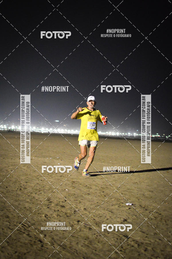 Buy your photos of the eventJovem Pan Night Run Santos on Fotop