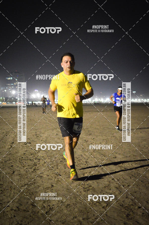 Buy your photos of the eventJovem Pan Night Run Santos on Fotop