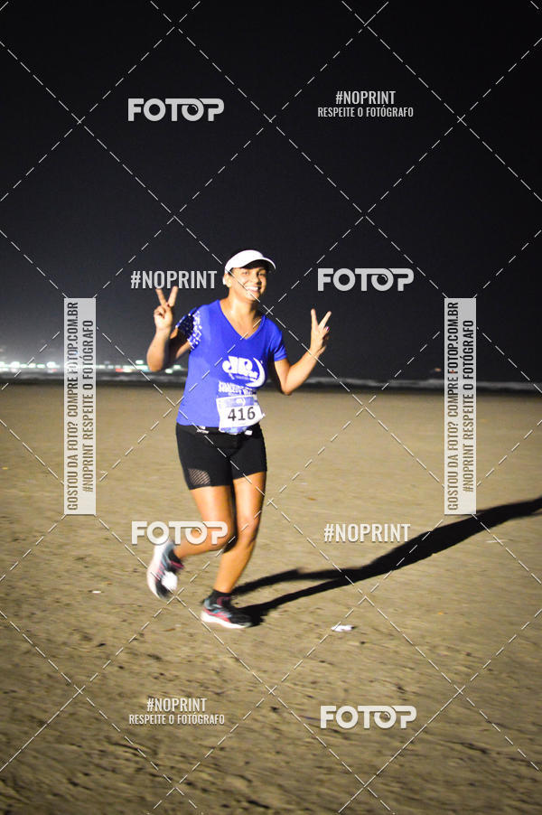 Buy your photos of the eventJovem Pan Night Run Santos on Fotop