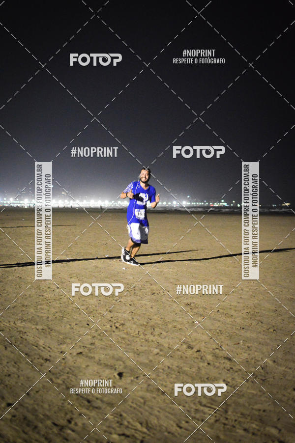 Buy your photos of the eventJovem Pan Night Run Santos on Fotop