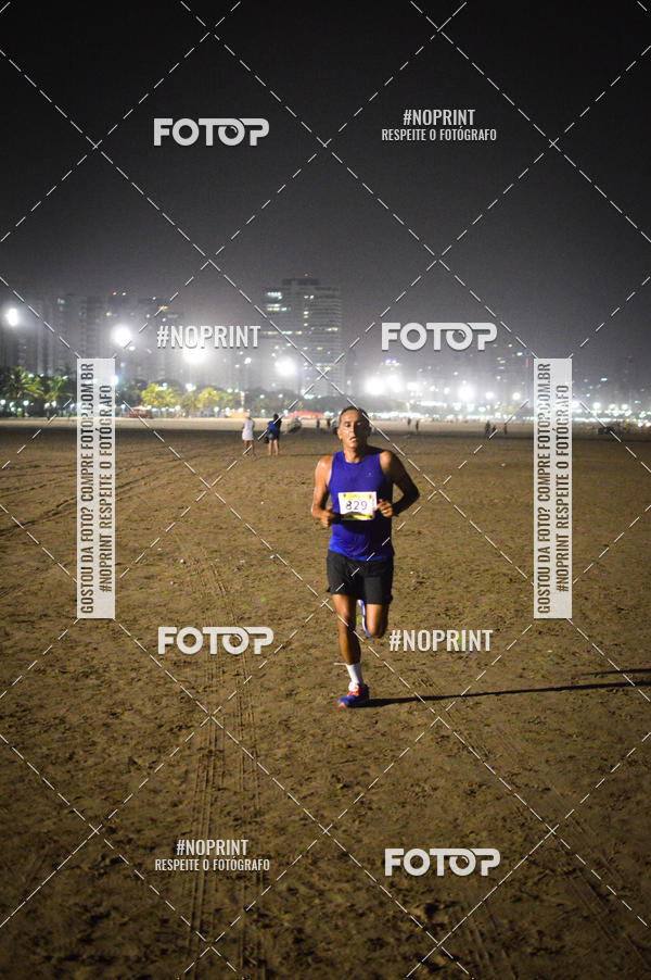 Buy your photos of the eventJovem Pan Night Run Santos on Fotop