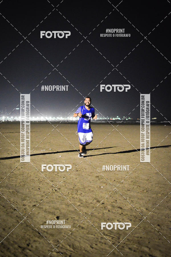 Buy your photos of the eventJovem Pan Night Run Santos on Fotop