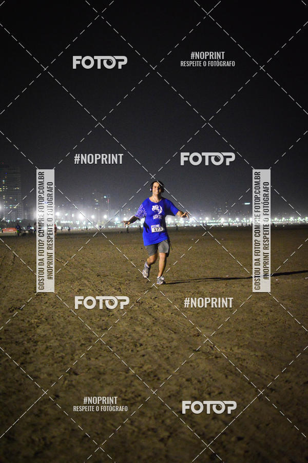 Buy your photos of the eventJovem Pan Night Run Santos on Fotop