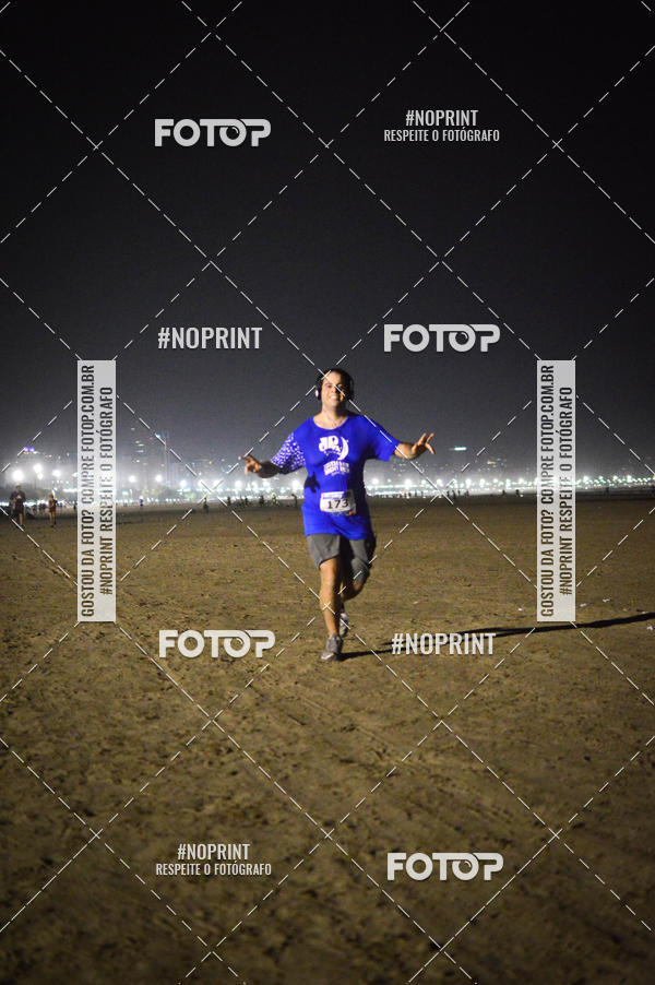 Buy your photos of the eventJovem Pan Night Run Santos on Fotop