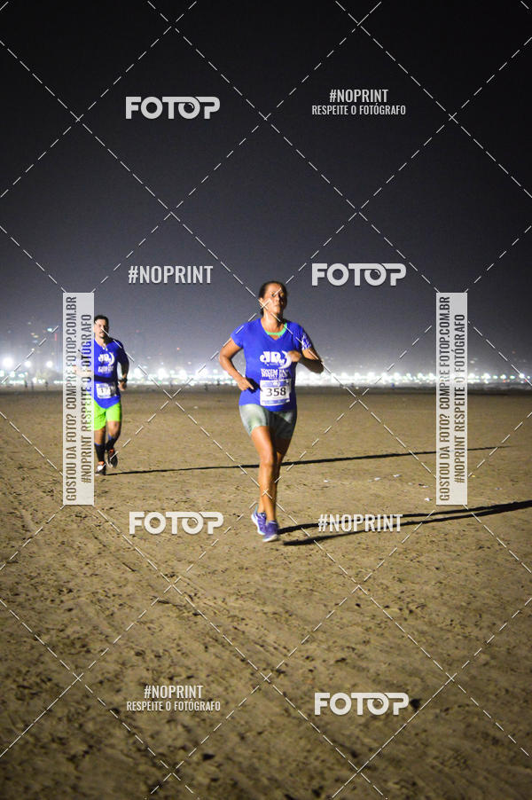 Buy your photos of the eventJovem Pan Night Run Santos on Fotop