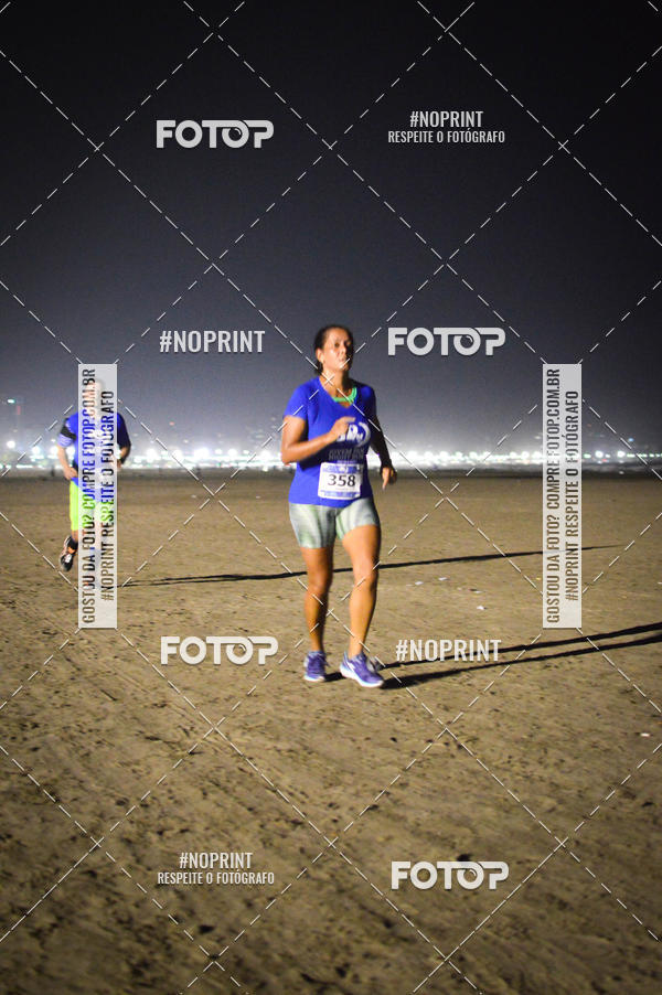 Buy your photos of the eventJovem Pan Night Run Santos on Fotop