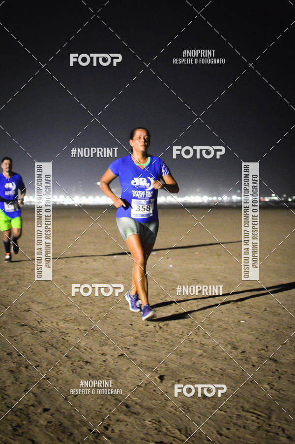 Buy your photos of the eventJovem Pan Night Run Santos on Fotop
