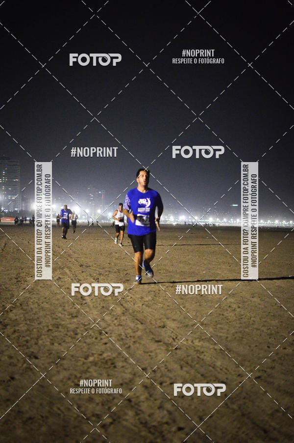 Buy your photos of the eventJovem Pan Night Run Santos on Fotop