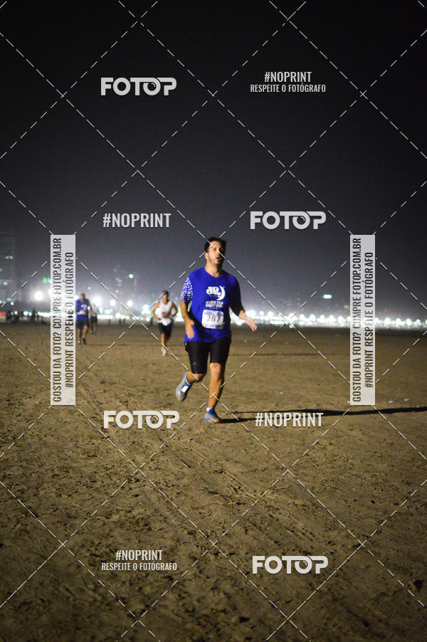 Buy your photos of the eventJovem Pan Night Run Santos on Fotop