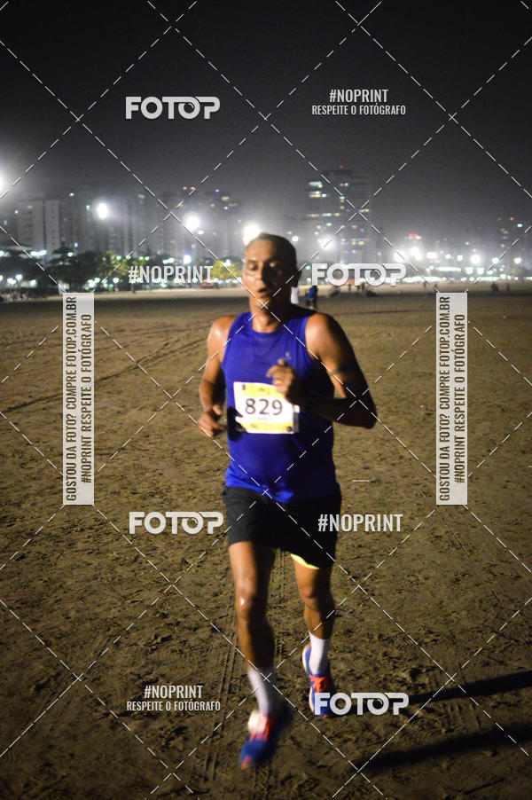 Buy your photos of the eventJovem Pan Night Run Santos on Fotop