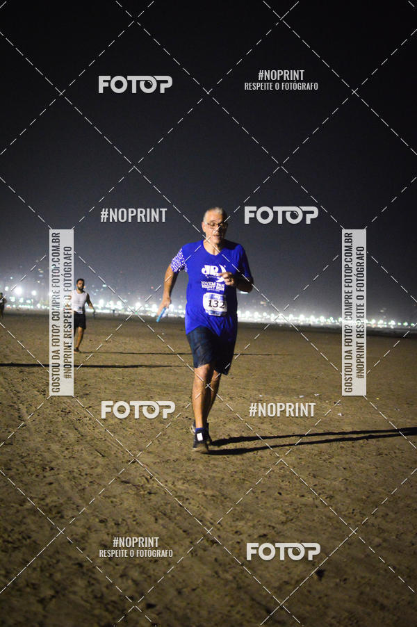 Buy your photos of the eventJovem Pan Night Run Santos on Fotop