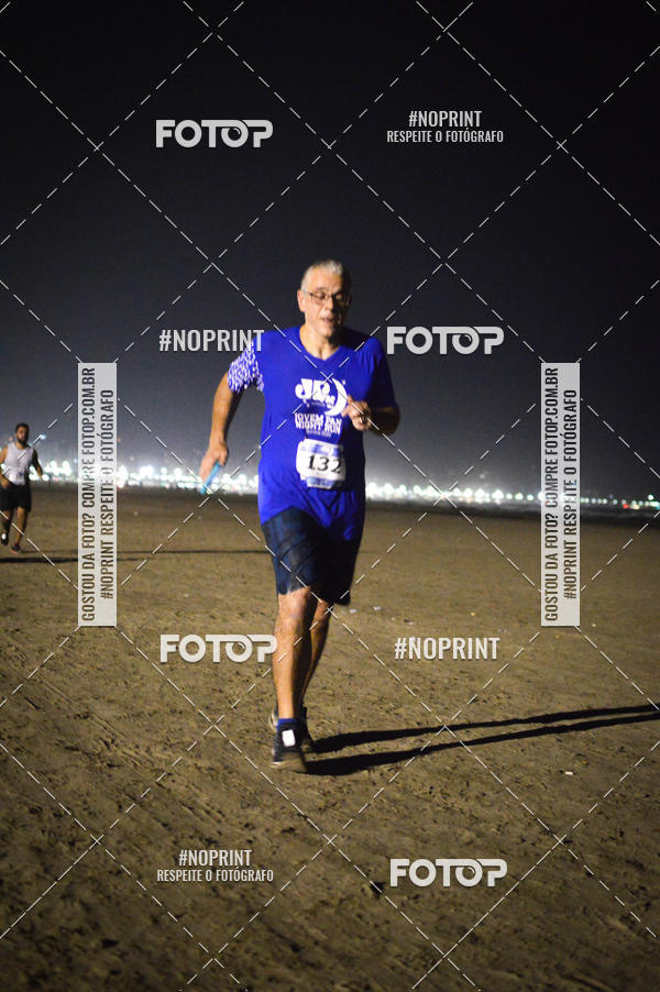 Buy your photos of the eventJovem Pan Night Run Santos on Fotop