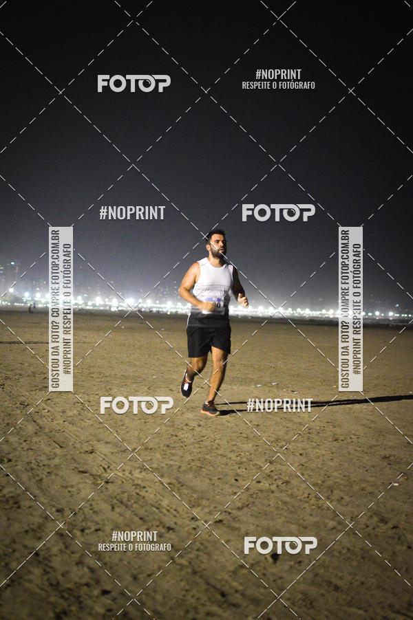 Buy your photos of the eventJovem Pan Night Run Santos on Fotop