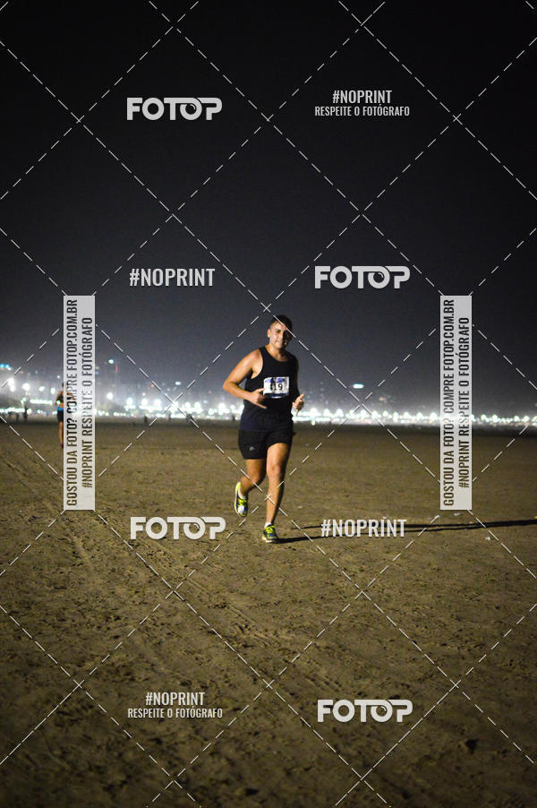 Buy your photos of the eventJovem Pan Night Run Santos on Fotop