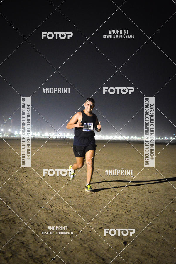 Buy your photos of the eventJovem Pan Night Run Santos on Fotop