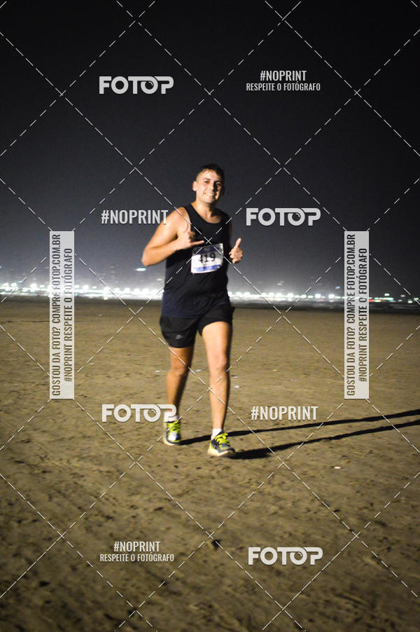 Buy your photos of the eventJovem Pan Night Run Santos on Fotop