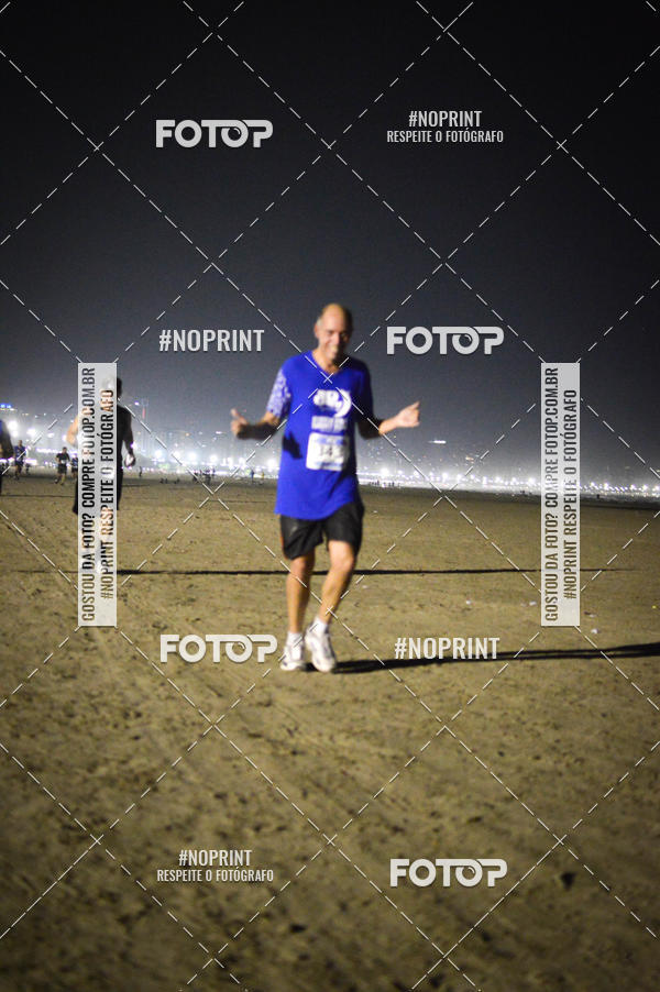 Buy your photos of the eventJovem Pan Night Run Santos on Fotop