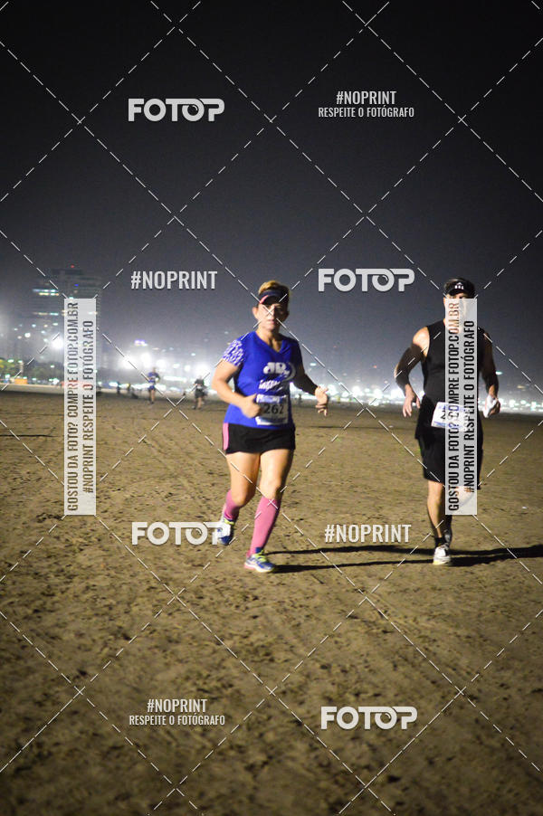 Buy your photos of the eventJovem Pan Night Run Santos on Fotop