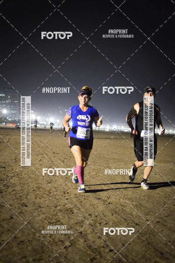 Buy your photos of the eventJovem Pan Night Run Santos on Fotop