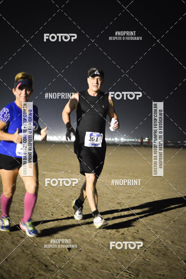 Buy your photos of the eventJovem Pan Night Run Santos on Fotop