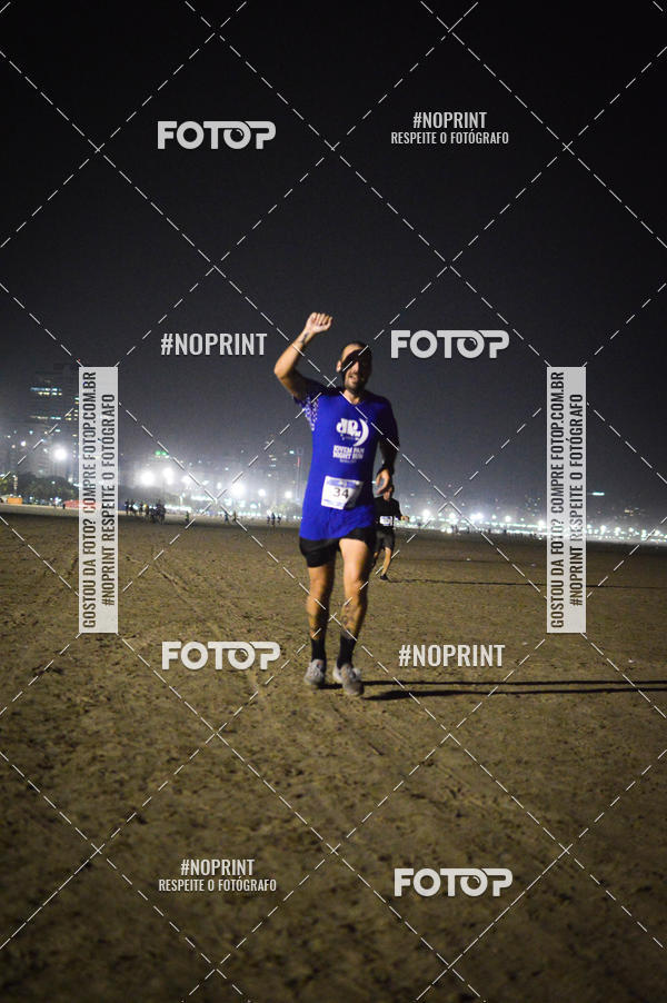 Buy your photos of the eventJovem Pan Night Run Santos on Fotop