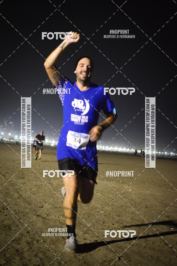Buy your photos of the eventJovem Pan Night Run Santos on Fotop
