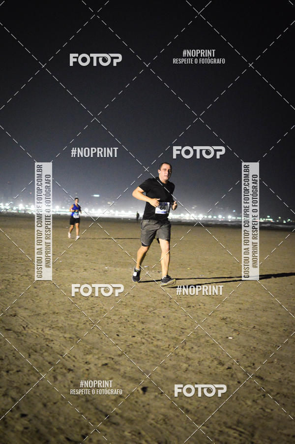 Buy your photos of the eventJovem Pan Night Run Santos on Fotop