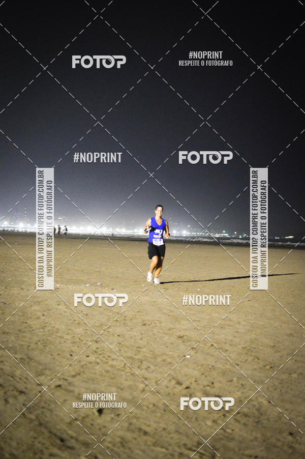 Buy your photos of the eventJovem Pan Night Run Santos on Fotop