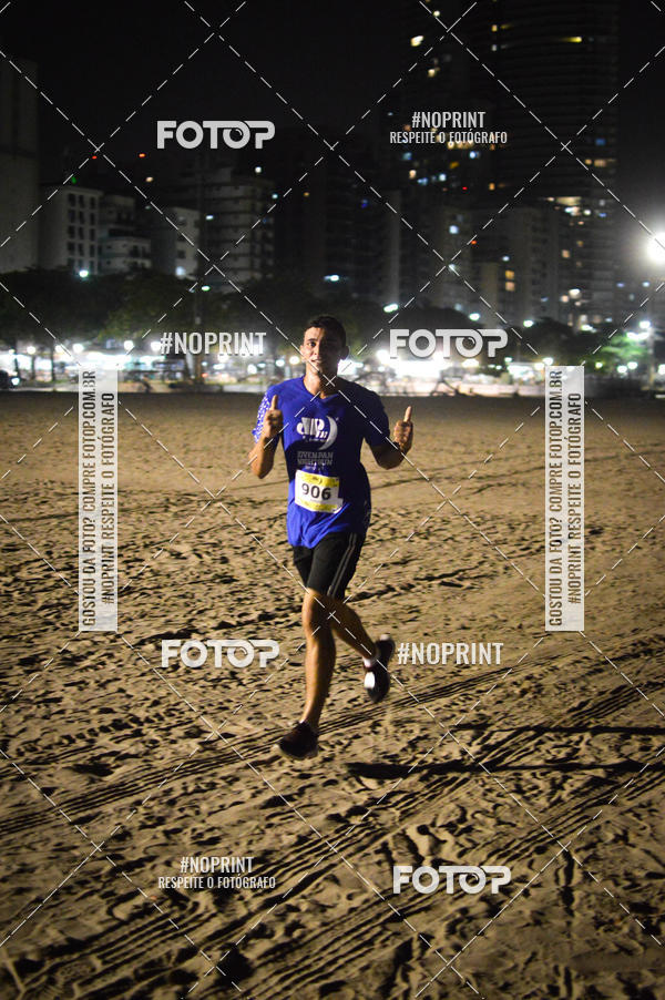 Buy your photos of the eventJovem Pan Night Run Santos on Fotop