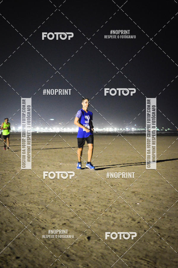 Buy your photos of the eventJovem Pan Night Run Santos on Fotop