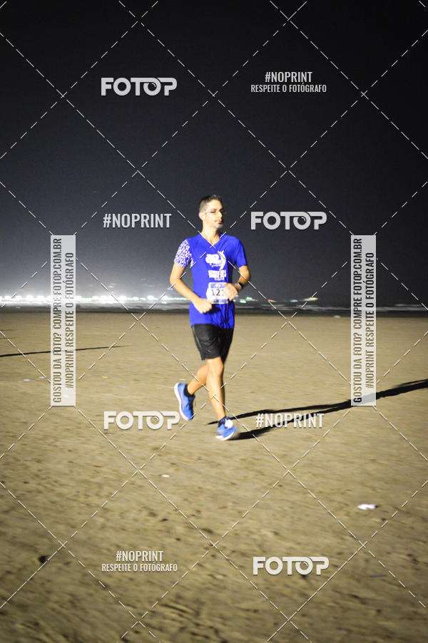 Buy your photos of the eventJovem Pan Night Run Santos on Fotop