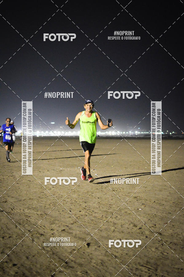 Buy your photos of the eventJovem Pan Night Run Santos on Fotop