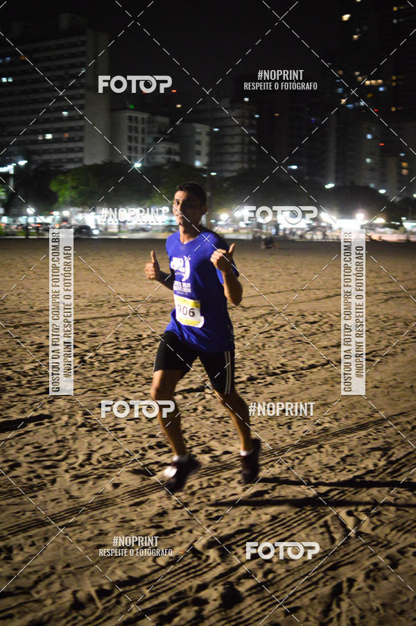 Buy your photos of the eventJovem Pan Night Run Santos on Fotop