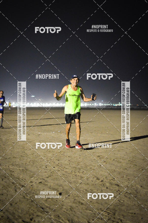 Buy your photos of the eventJovem Pan Night Run Santos on Fotop