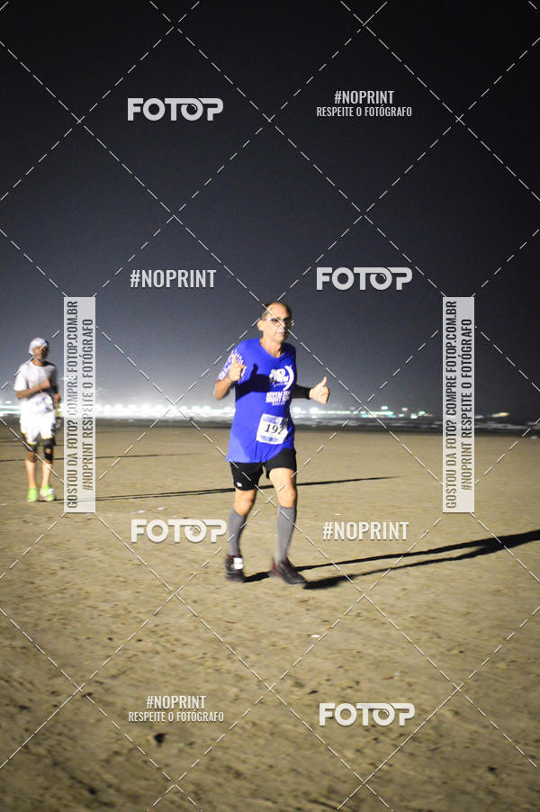 Buy your photos of the eventJovem Pan Night Run Santos on Fotop