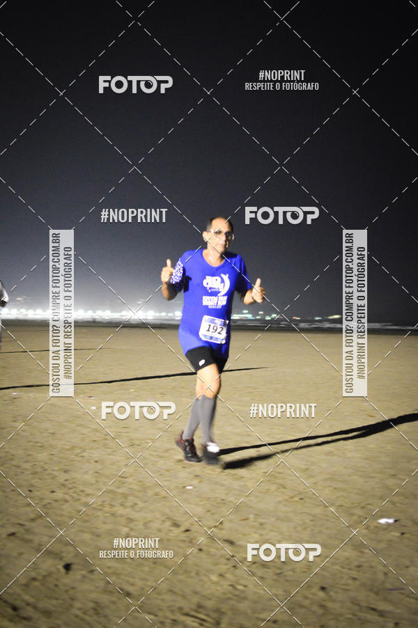 Buy your photos of the eventJovem Pan Night Run Santos on Fotop