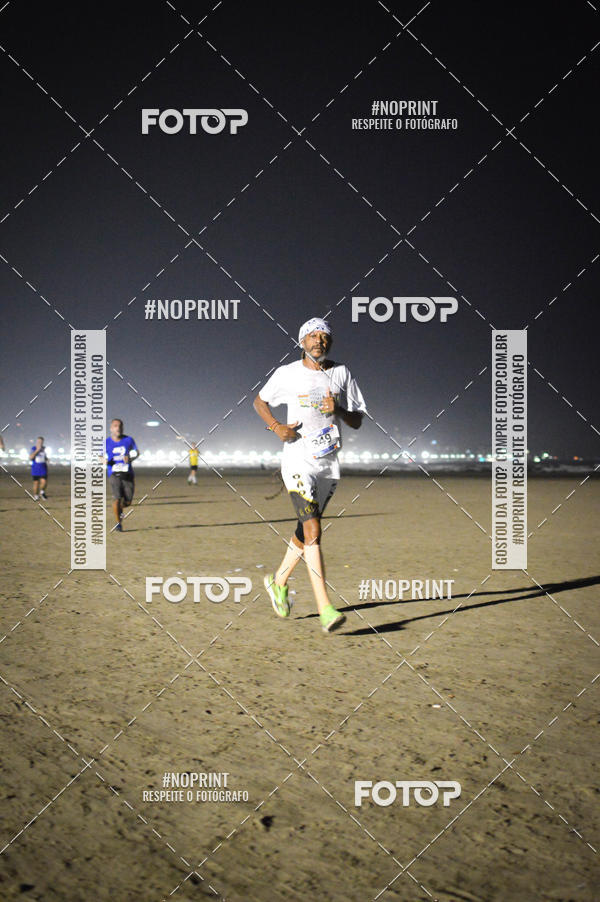 Buy your photos of the eventJovem Pan Night Run Santos on Fotop
