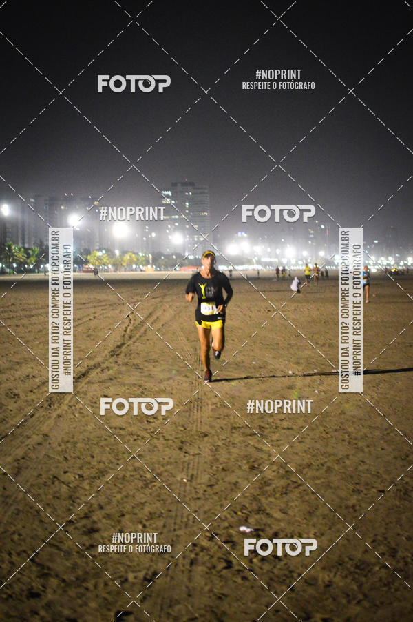 Buy your photos of the eventJovem Pan Night Run Santos on Fotop