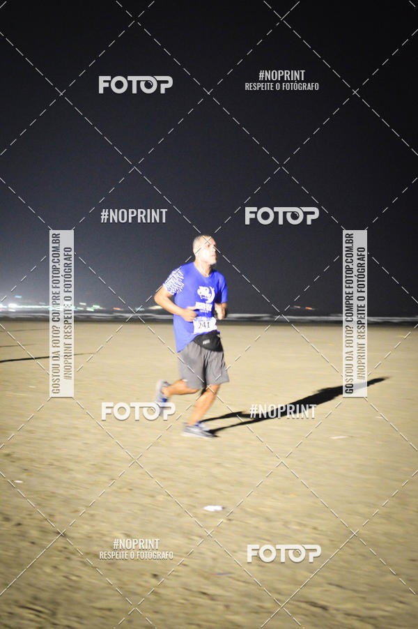 Buy your photos of the eventJovem Pan Night Run Santos on Fotop
