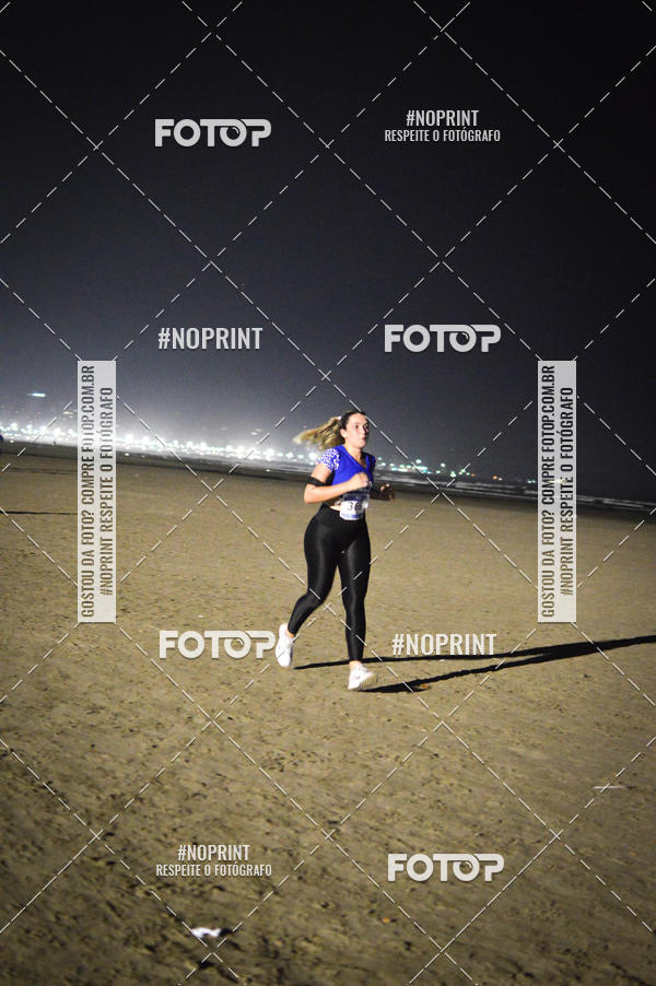 Buy your photos of the eventJovem Pan Night Run Santos on Fotop