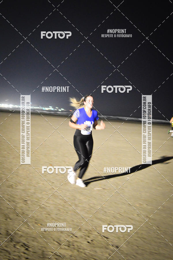 Buy your photos of the eventJovem Pan Night Run Santos on Fotop