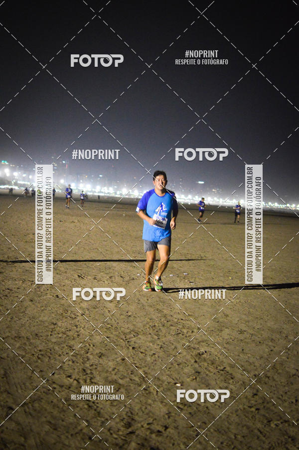 Buy your photos of the eventJovem Pan Night Run Santos on Fotop