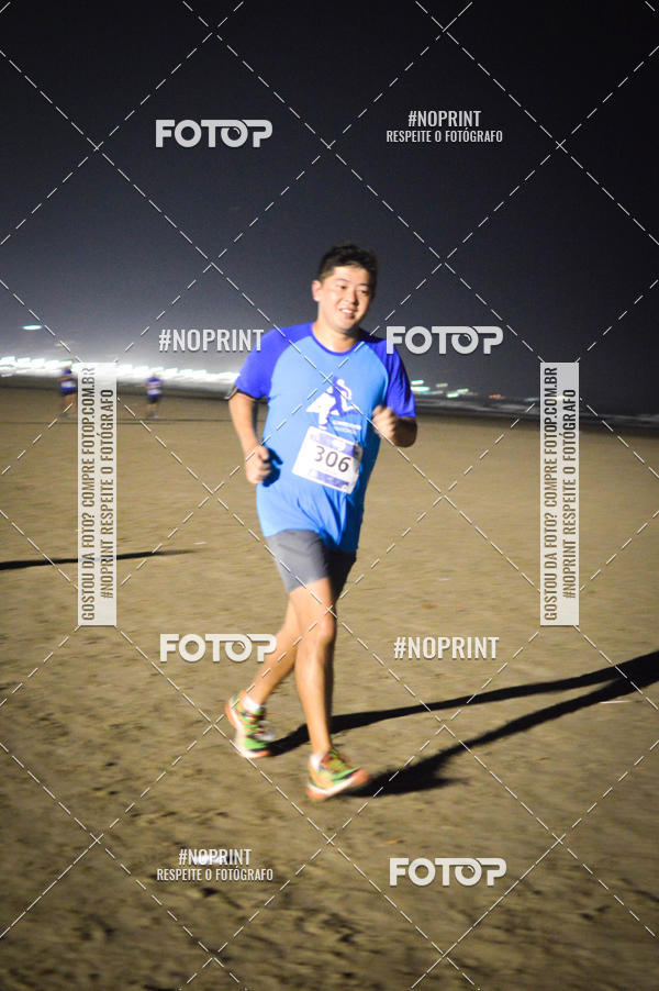 Buy your photos of the eventJovem Pan Night Run Santos on Fotop