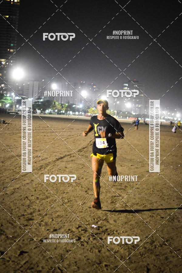 Buy your photos of the eventJovem Pan Night Run Santos on Fotop