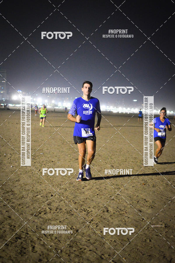 Buy your photos of the eventJovem Pan Night Run Santos on Fotop