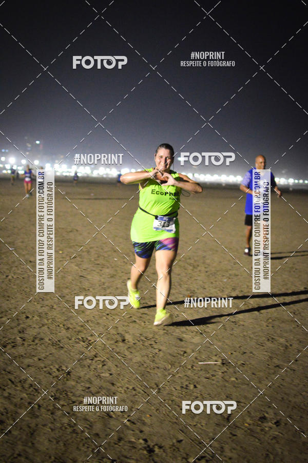 Buy your photos of the eventJovem Pan Night Run Santos on Fotop