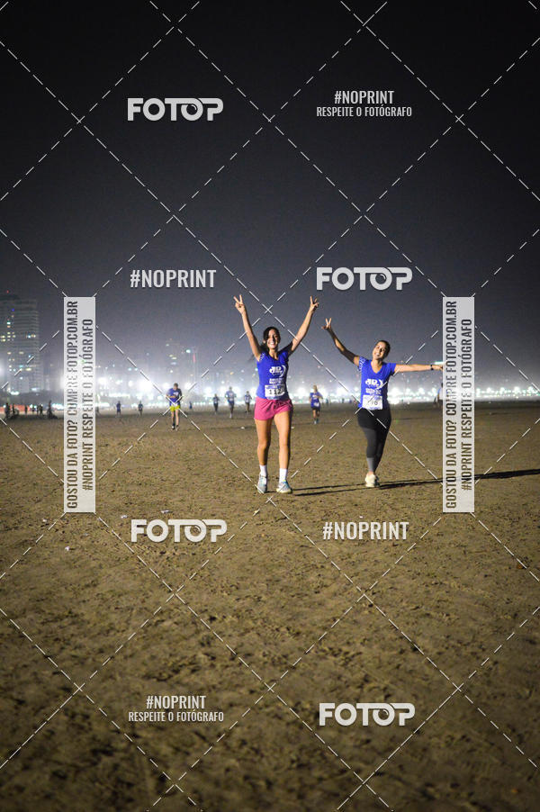 Buy your photos of the eventJovem Pan Night Run Santos on Fotop