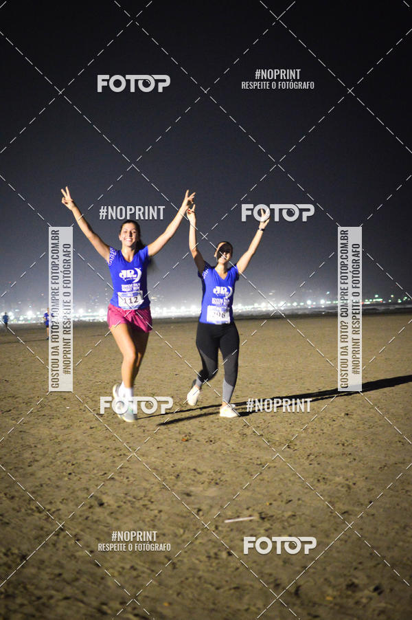 Buy your photos of the eventJovem Pan Night Run Santos on Fotop