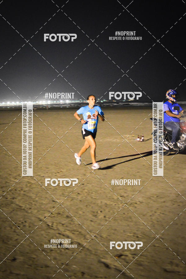 Buy your photos of the eventJovem Pan Night Run Santos on Fotop