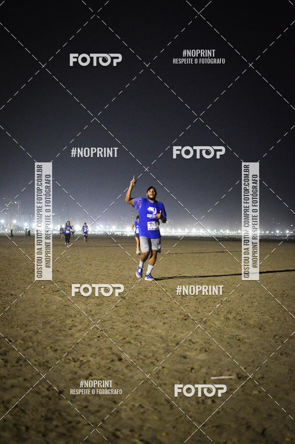 Buy your photos of the eventJovem Pan Night Run Santos on Fotop